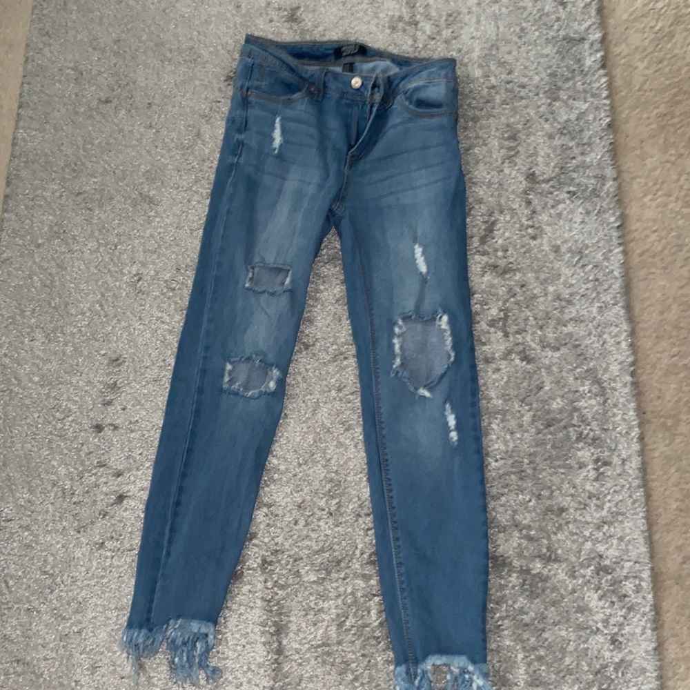 Ripped ankle jeans